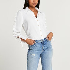 White ruffle long sleeve shirt