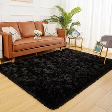 Antrese Shag Black Area Rug