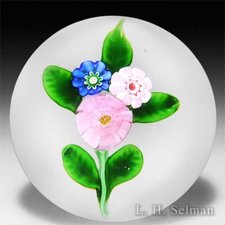 Antique Clichy three-flower nosegay with pink cabbage rose paperweight. by Clichy