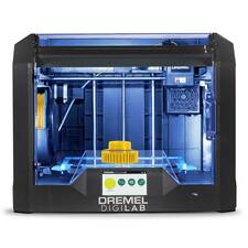 Front image of 3D45-01 3D printer with printed gear on bed, powered on and lit up.