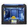 Front image of 3D45-01 3D printer with printed gear on bed, powered on and lit up.