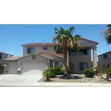 STUNNING HOME LOCATION WITH TWO STORY HOME WITH DRAMATIC SOARING CEILINGS