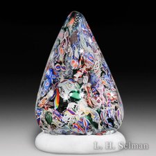John Deacons 2014 large Christmas Tree on a white pedestal end-of-day paperweight. by John Deacons