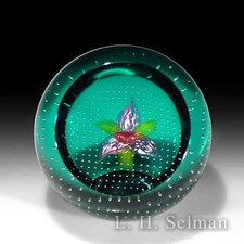 Caithness mauve, pink & white orchid on turquoise ground by Caithness  Glass Inc