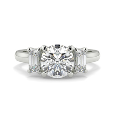 Round with Emerald Trilogy Diamond Ring