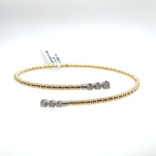 .35ctw Diamond Bypass Flex Bangle Containing: 6 Round Diamonds; I; Si1; 14kyw