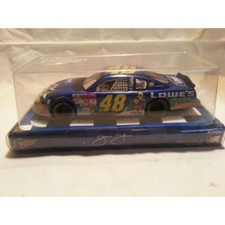 2002 Rookie Year Jimmie Johnson #48 Lowes Looney Tunes Tweety Sylvester Yellow Rookie Stripes 1/24 Scale Diecast Car Winners Circle