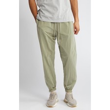 Fear of God Essentials Stretch Nylon Track Joggers, Main, color, Garden Yellow