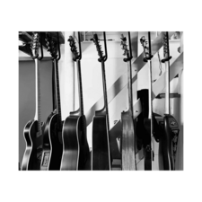 guitars-hanged-through-guitar-bar-hanger