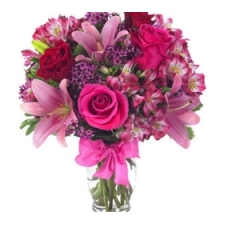 Asiatic lilies and wax-flower