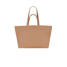 Female Model wearing Cuyana Easy Tote Handbags. Showing image 1 of 6