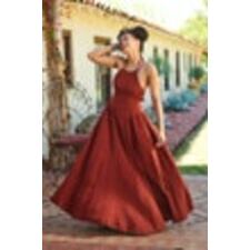 Red Clay Halter Maxi Dress with model Khay twirling 