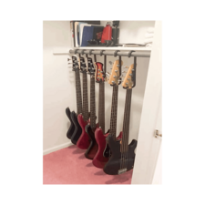 guitars-hanged-through-guitar-bar-hanger