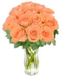 Orange Roses In A Vase at A...