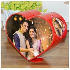 Personalized spinning heart shaped photo frame