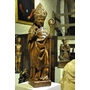 A LATE 15TH CENTURY NORMAN OAK SCULPTURE OF A BISHOP / SAINT. CIRCA 1480.