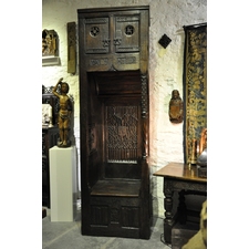 AN EXCEEDINGLY RARE AND IMPORTANT MEDIEVAL OAK CONFESSIONAL CHAIR. NORMAN. CIRCA 1470.
