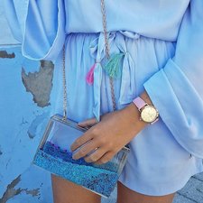 Classic rosegold women's watch with a gold dial. Finished  with a genuine pink leather strap. Perfect accessory to match jewelry and accessories.