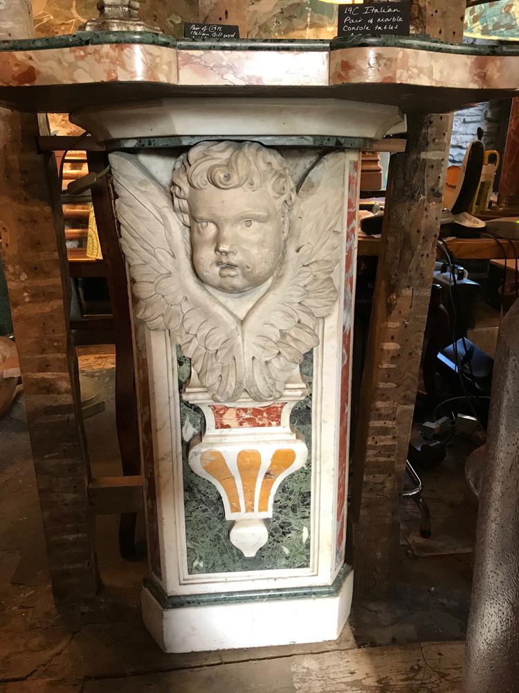 Pair of marble consoles