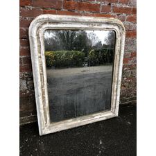 A Delightful Antique French 19th Century carved wood and gesso arched top distressed Louis Philippe Mirror.